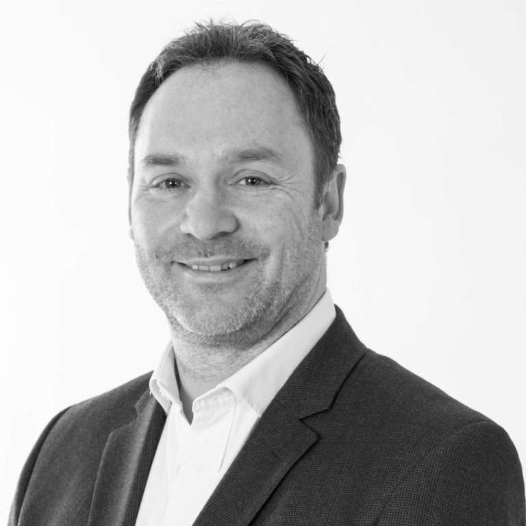 Damien Mulligan in a suit